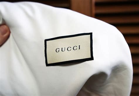 what is the fake gucci logo|authentic gucci tag.